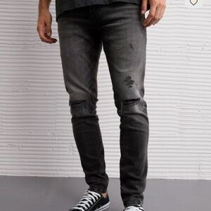 American Eagle Airflex black distressed jeans